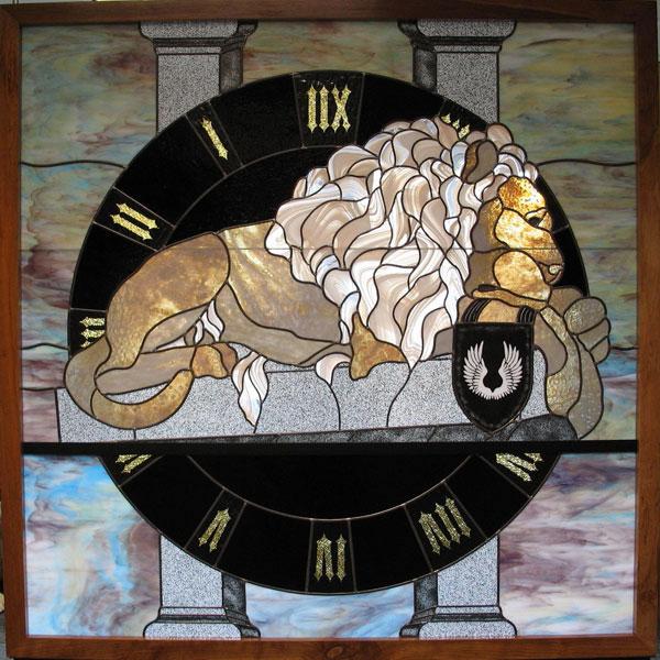 This stained glass window is by Sue Morrison, known to her classmates as Sam (Thompson), from the Charter-Founders-Inaugural class of 1971-72. It is 5' x 5', and it depicts the clock face (my class funded the restoration of the clock), my favorite lion scupture, and the Ridgway family crest. It screens the sitting area on the west end of the hall on the second floor of Ridgway Centre.